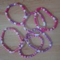 Klik her for at se flere billeder og f� mere information om varen:&nbsp; Armbånd/Perler - 6ass. Pink/Rosa/Lilla